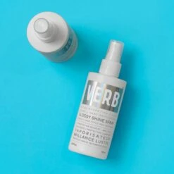 Glossy Shine Spray With Heat Protection -VIRTUE Shop 7 Verb Glossy Shine Spray Flatlay Blue